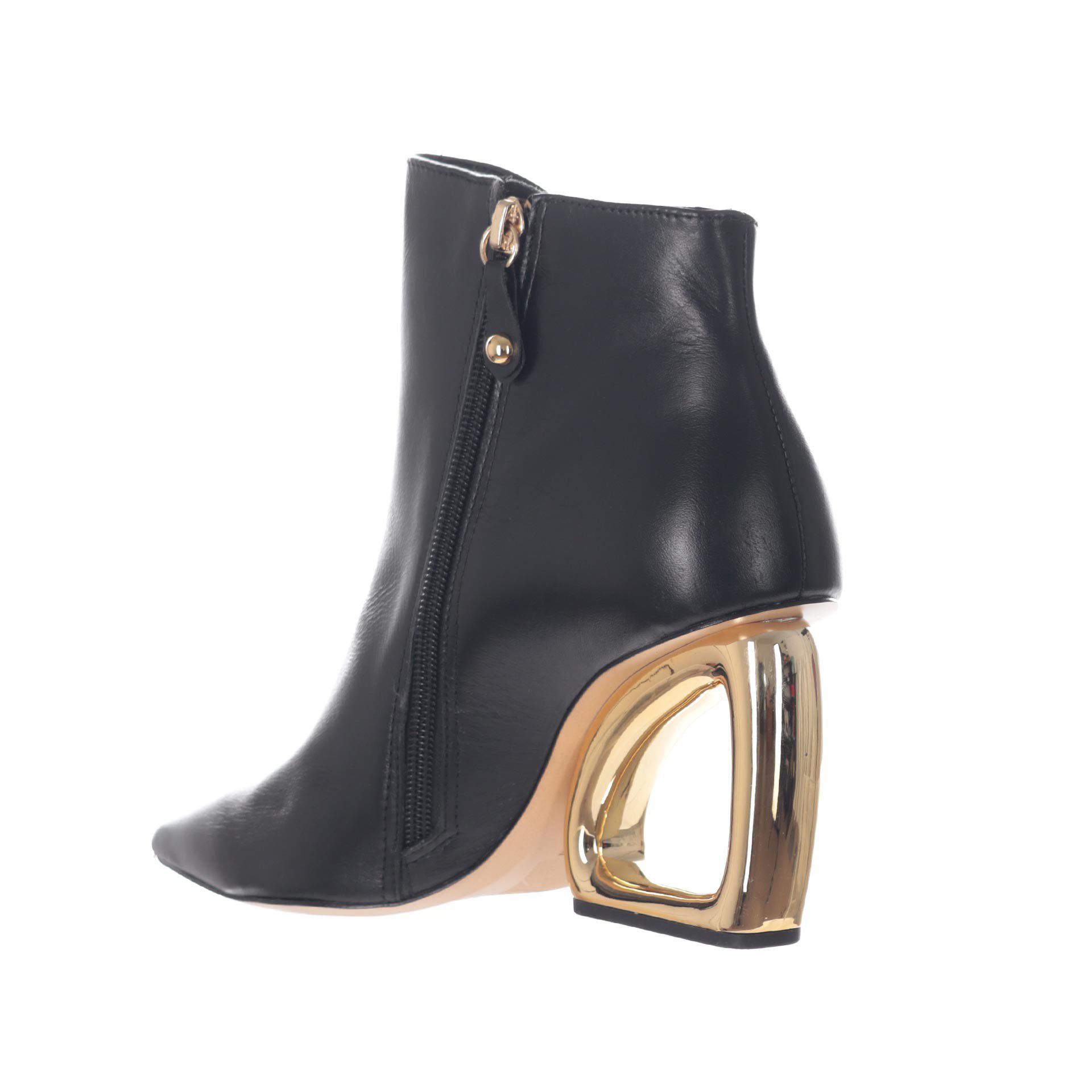Cecconello tronchetto in pelle con tacco oro svuotato da donna