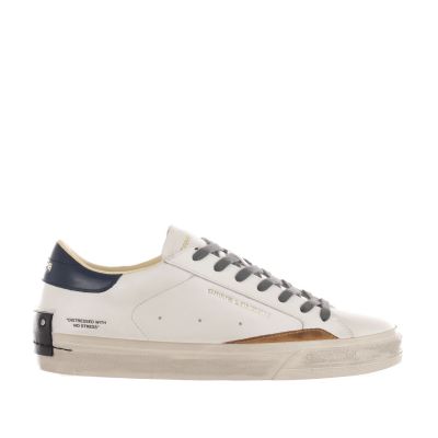 Sneaker distressed in pelle