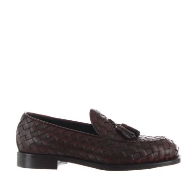 Mocassino in pelle intrecciata con nappine